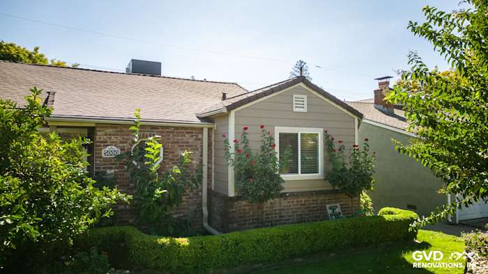 Khaki Brown James Hardie siding on a Sacramento home's exterior with lush landscaping and modern aesthetic