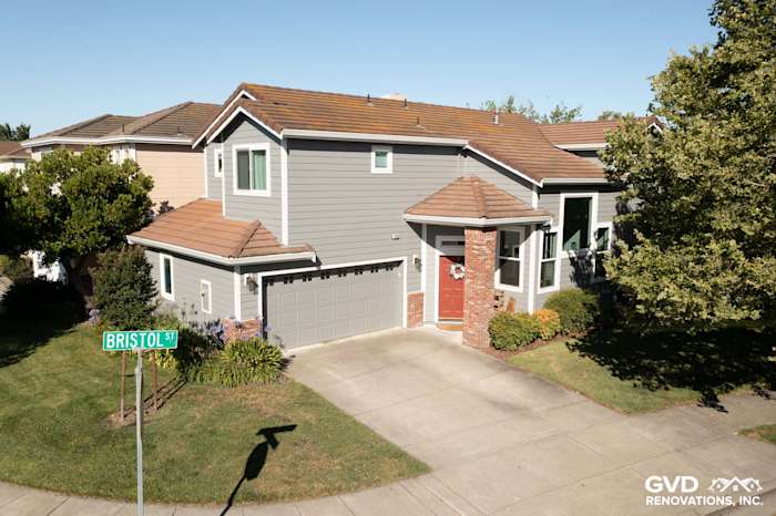 Home exterior featuring Gray Slate James Hardie siding, Arctic White trim, and Milgard windows in Petaluma, CA