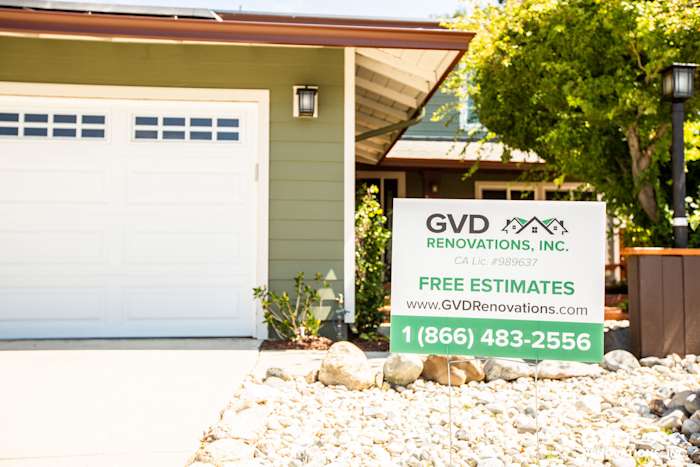 Exterior view of a home in Pleasanton showcasing freshly installed James Hardie siding and a GVD Renovations sign