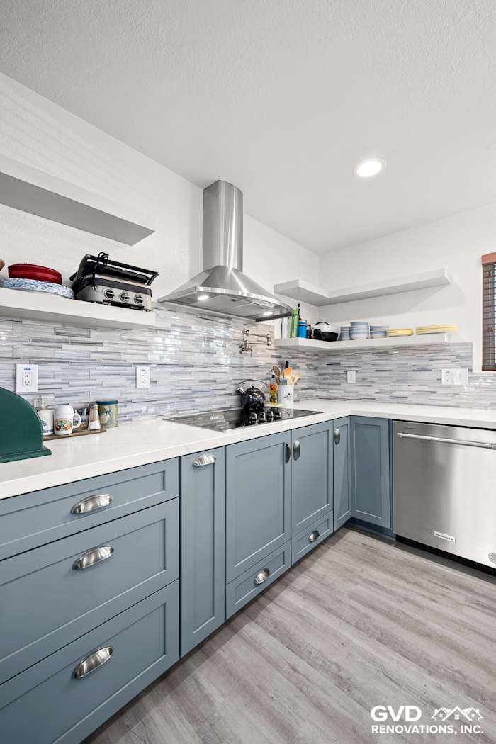 Modern kitchen remodel featuring Waypoint cabinets, Calacatta Ultra countertops, and Misty Fjord backsplash in Elk Grove