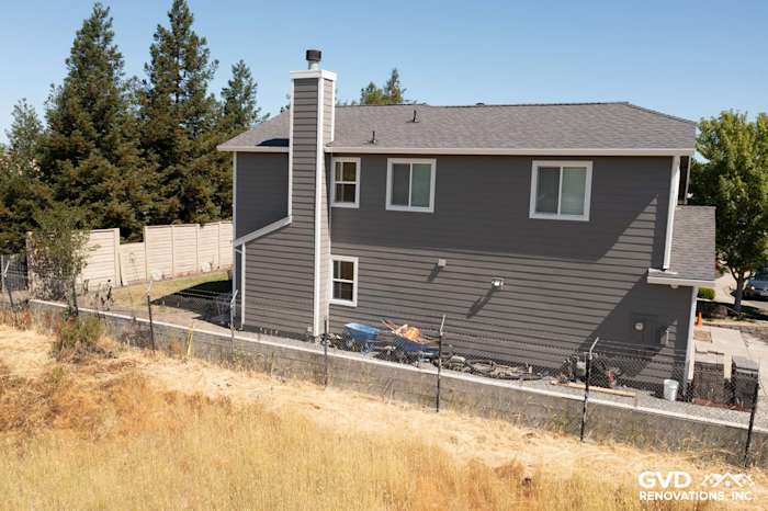 Home exterior featuring James Hardie Aged Pewter siding and Arctic White trim in Rohnert Park, CA