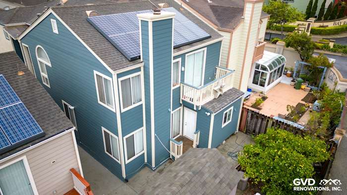 Evening Blue James Hardie lap siding on a modern home exterior with solar panels in Daly City