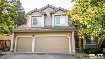 Front view of a home in Santa Rosa featuring Khaki Brown James Hardie siding and Alside vinyl windows