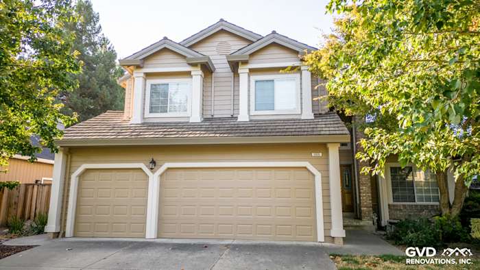 Front view of a home in Santa Rosa featuring Khaki Brown James Hardie siding and Alside vinyl windows