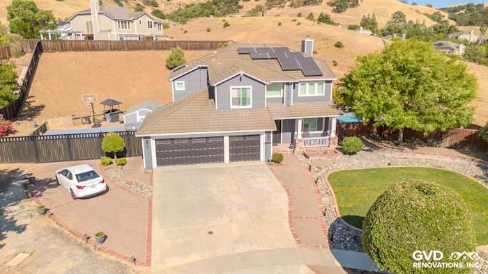 Home exterior featuring James Hardie Lap Siding in Night Gray with Arctic White trim in San Jose
