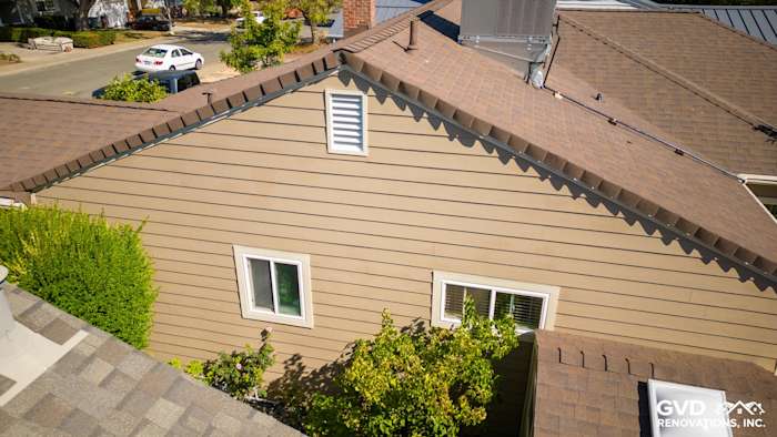 New Khaki Brown James Hardie siding on a Sacramento home's exterior, featuring clean lines and modern design