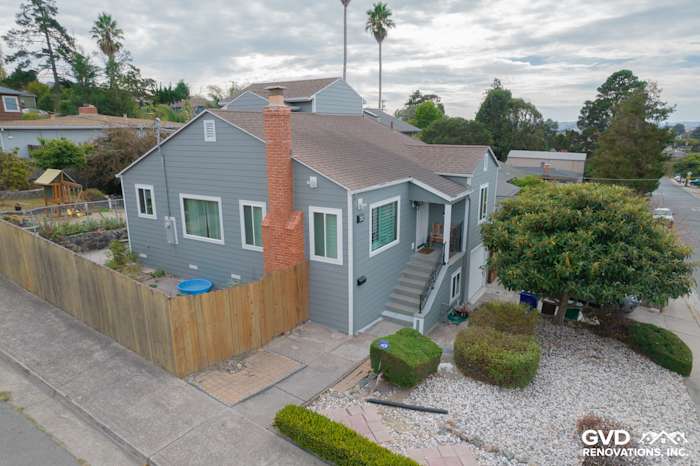 Modern Gray Slate siding with Arctic White trim on a Richmond, CA home, featuring a landscaped exterior and steps