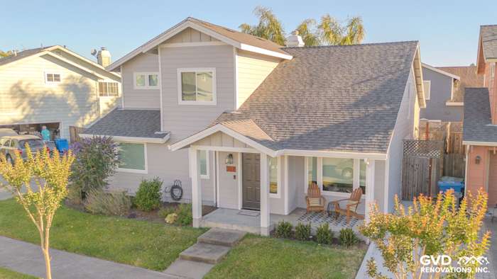 Modern home exterior in Petaluma featuring James Hardie Lap Siding in Pearl Gray with Arctic White trim and Anlin Windows