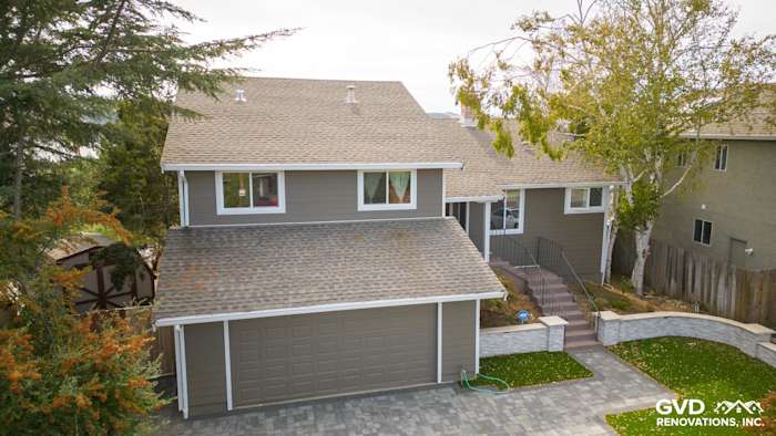 Home exterior featuring Timber Bark HardiePlank siding and Arctic White HardieTrim in Benicia, CA
