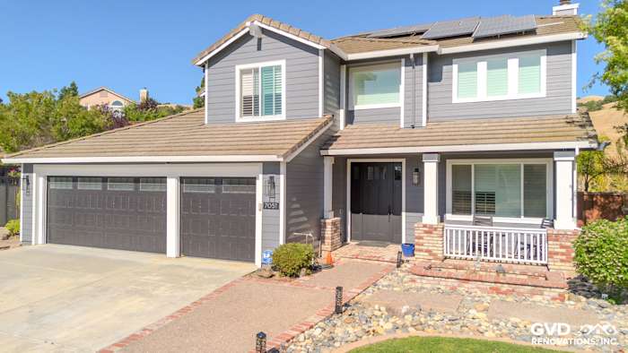 Home exterior featuring James Hardie Lap Siding in Night Gray with Arctic White trim, enhancing curb appeal in San Jose