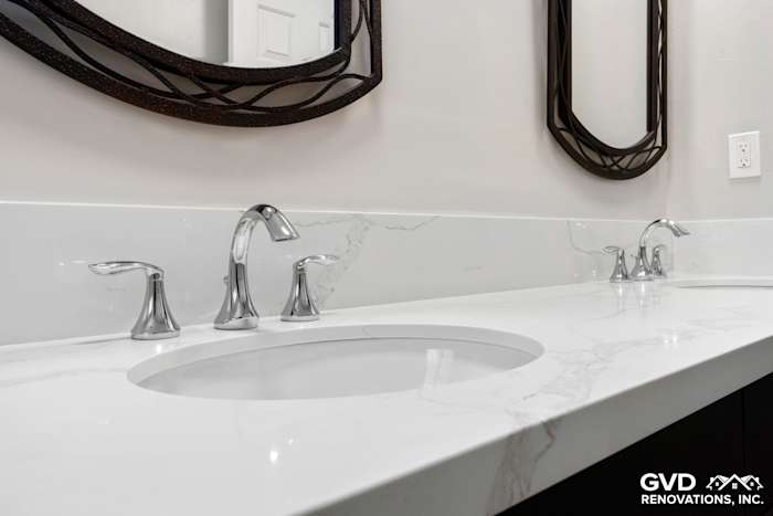 Modern bathroom vanity with quartz countertop, sleek faucets, and stylish mirrors in Rocklin, CA remodel