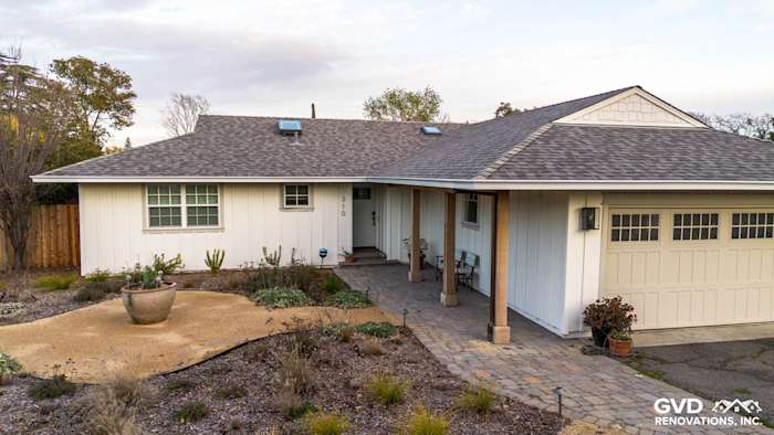 Modern home exterior featuring James HardiePanel Vertical Siding and HardieTrim in Arctic White, Pleasant Hill