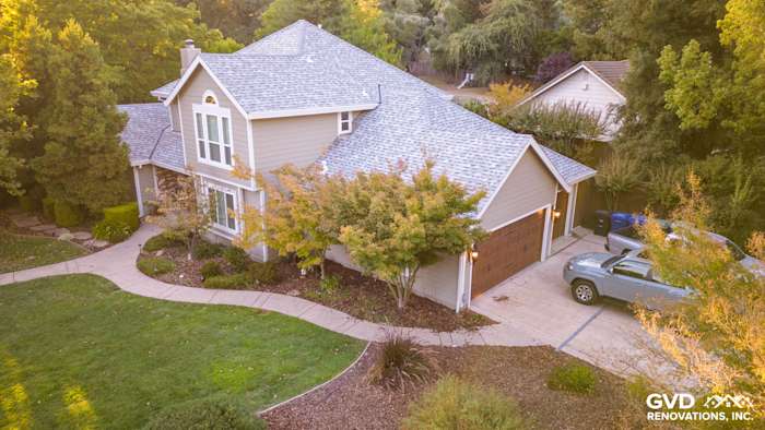Home exterior featuring newly installed James Hardie Cedarmill siding in Monterey Taupe and Arctic White trim in Fair Oaks