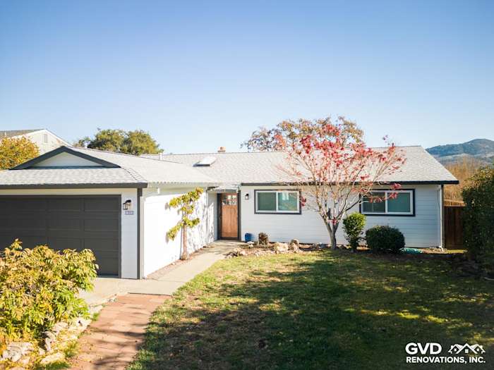 Modern Napa home exterior featuring Arctic White James Hardie siding and a stylish garage door