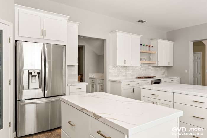 Modern kitchen in Roseville with Diamond cabinets, MSI countertops, and sleek full-height backsplash