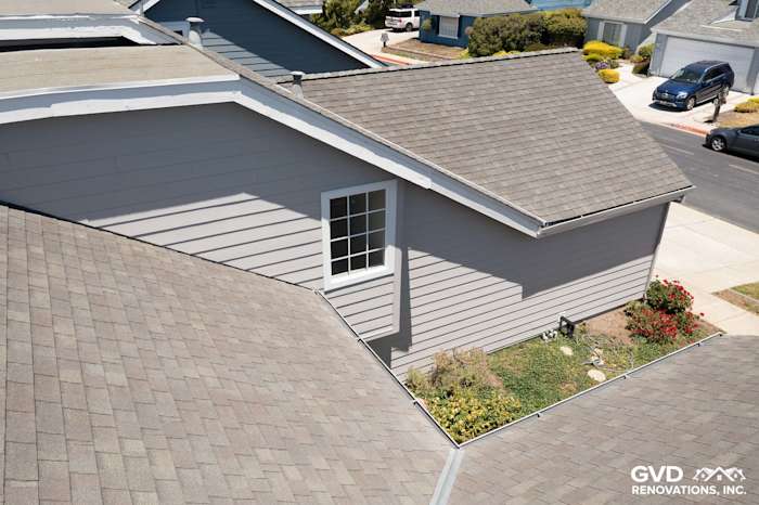 Pearl Gray James Hardie Plank Lap Siding with Arctic White HardieTrim Boards on a Foster City home