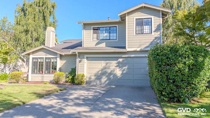 Home exterior in Alameda, CA featuring James Hardie Monterey Taupe siding and Andersen A100 windows