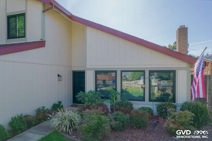 Home exterior in Orangevale featuring T1-11 siding, Anlin windows, and updated landscaping