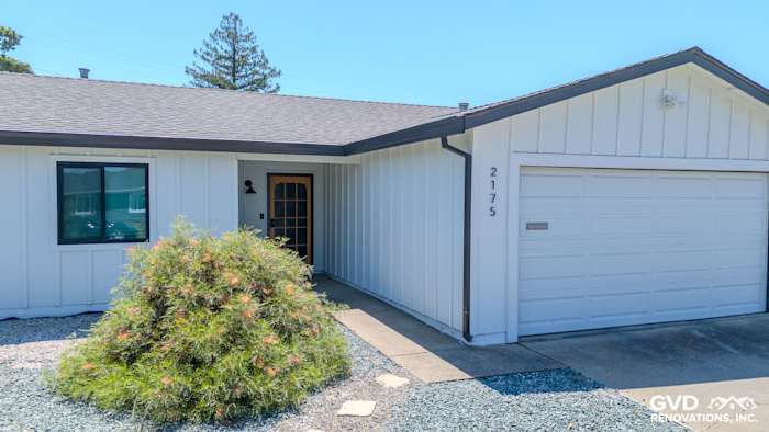 Arctic White James Hardie Board & Batten siding with Anlin windows on home exterior in Rancho Cordova