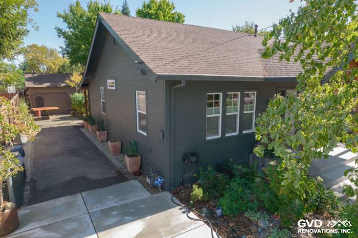 Home exterior featuring James Hardie Iron Gray siding and contrasting trim in Sacramento's modern renovation