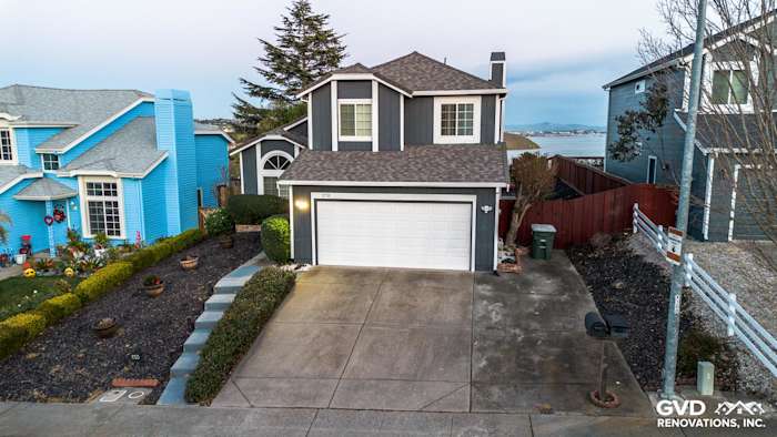 Modern home exterior in Vallejo featuring James Hardie Evening Blue siding and Arctic White trim