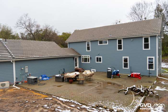 New Boothbay Blue James Hardie siding and Milgard windows on a Sutter Creek home exterior with a patio