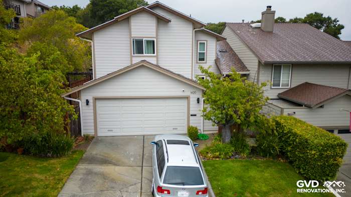 Newly installed James Hardie Cobble Stone siding and Khaki Brown trim on a home exterior in San Mateo, CA
