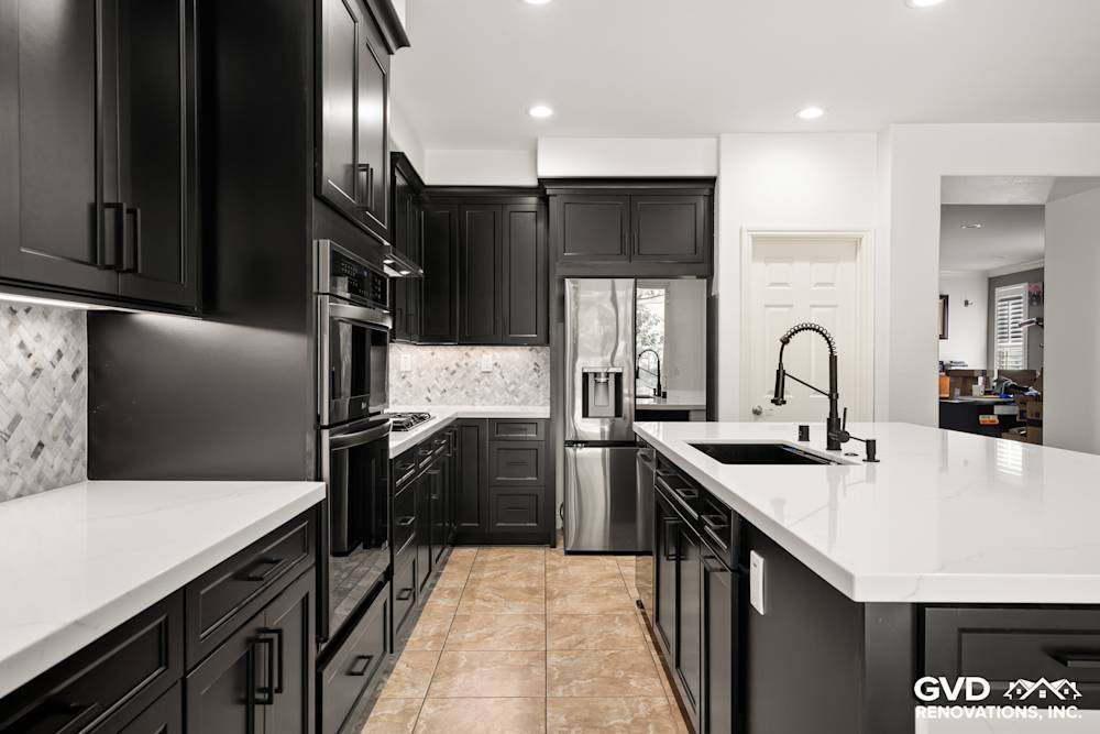 Modern kitchen renovation in Roseville with Waypoint cabinets, MSI countertops, and built-in pet feeding station