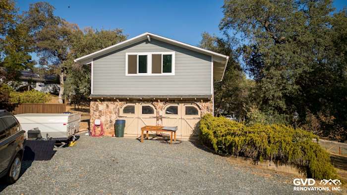 Gray Slate James Hardie siding with Arctic White trim on a renovated home exterior in Meadow Vista