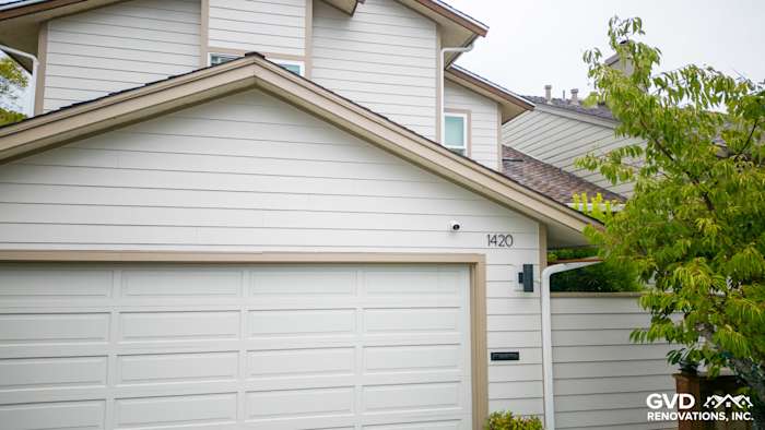 Home exterior in San Mateo with James Hardie Cobble Stone siding and Khaki Brown trim. Modern design and clean lines