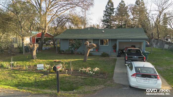 Home exterior featuring Boothbay Blue James Hardie siding and Anlin windows in Orangevale, CA