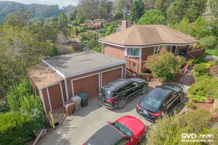 Updated home exterior in Mill Valley with James Hardie Lap Siding and Anlin Catalina Windows, surrounded by greenery