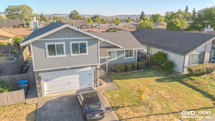 Home exterior featuring James Hardie Lap Plank Siding in Gray Slate with Arctic White Trim in Petaluma, CA