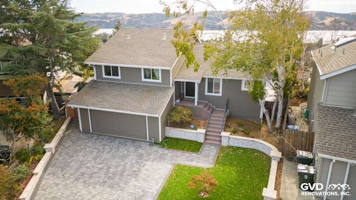 Home exterior showcasing Timber Bark HardiePlank siding and Arctic White HardieTrim in Benicia, CA