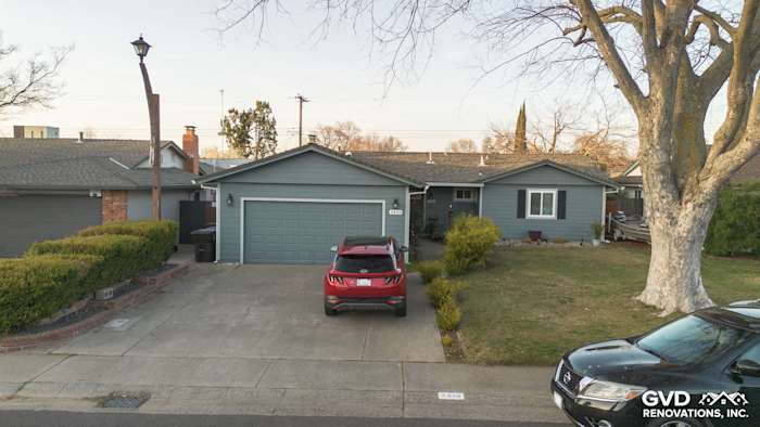 Modern Rancho Cordova home featuring Boothbay Blue James Hardie siding and new gutters