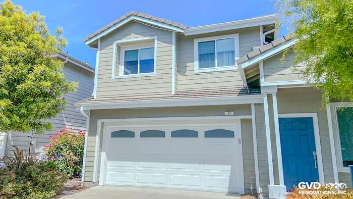 Monterey Taupe James Hardie siding with Arctic White trim and Anlin windows on Richmond, CA home exterior