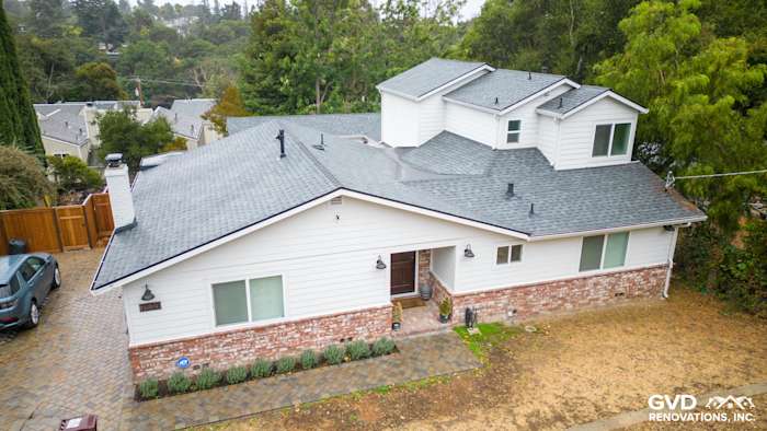Updated Oakland home featuring James Hardie Cedarmill siding, Alside windows, and a modern roof design