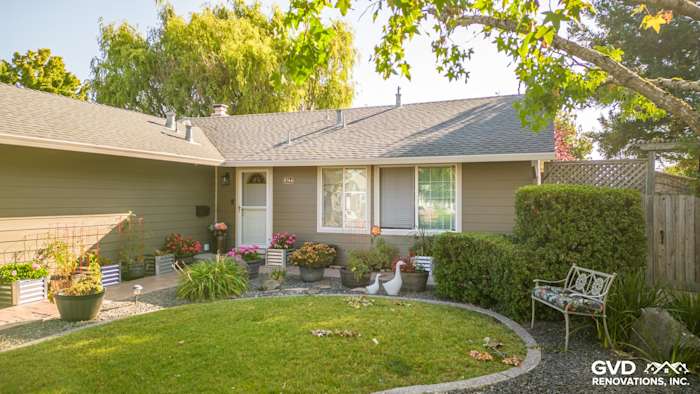 Home exterior featuring Timber Bark James Hardie Siding and Cobble Stone trim with landscaped garden in Rohnert Park