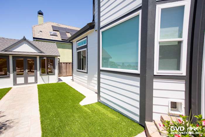 Home exterior featuring Arctic White James Hardie lap siding and Iron Gray trim in Hayward, CA