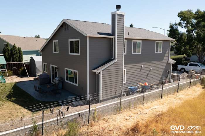 Exterior of a home in Rohnert Park featuring James Hardie Aged Pewter siding and Arctic White trim