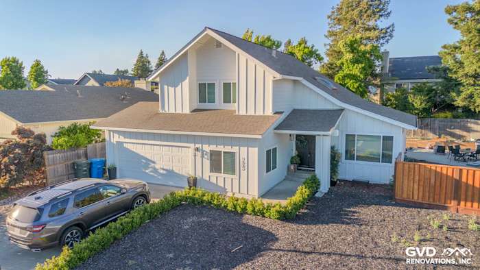 Home exterior featuring James Hardie Lap & Batten Siding and Anlin Windows in Arctic White, enhancing curb appeal in Petaluma