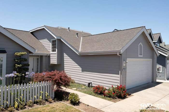 Pearl gray James Hardie plank lap siding with Arctic White trim, updated exterior in Foster City