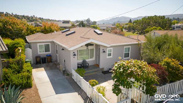Pearl Gray James Hardie shingle siding with Arctic White trim on a Mill Valley home, showcasing exterior landscaping