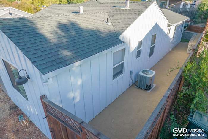 Modern Concord home featuring Arctic White James Hardie siding, trim, and new shaded patio area