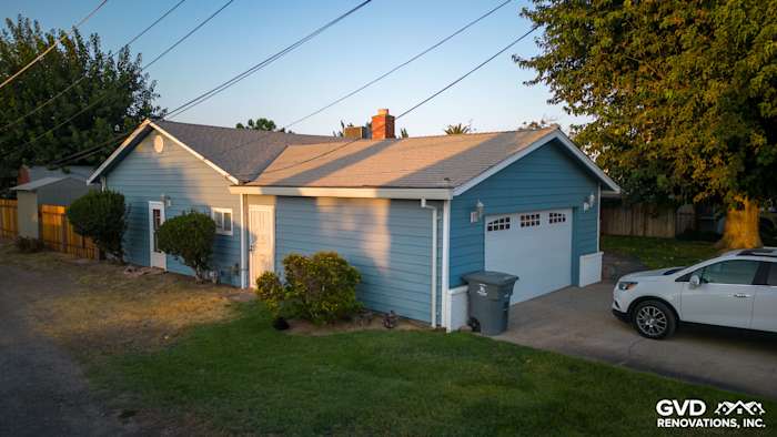 New Alside Prodigy Vinyl Siding on a residential home in Yuba City, featuring a light blue exterior with garage