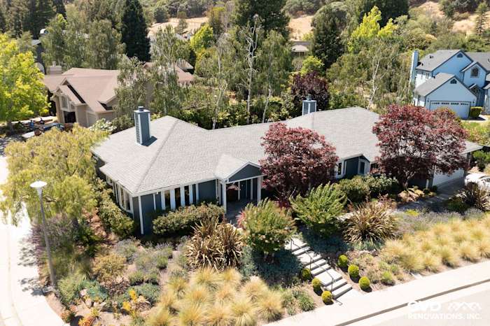 Updated home exterior featuring James Hardie Evening Blue siding and Arctic White trim in San Rafael, CA