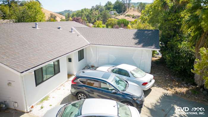 Modern home exterior in Pinole with Arctic White James Hardie siding and a well-maintained driveway