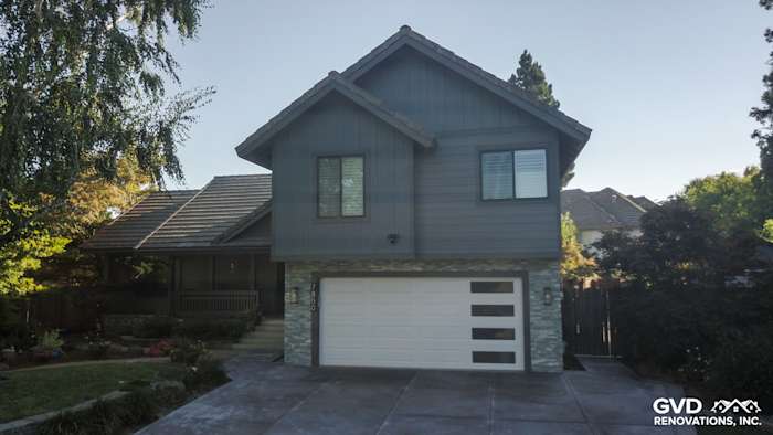 Sleek exterior transformation featuring Night Gray HardiePlank siding and Iron Gray HardieTrim boards in Sacramento