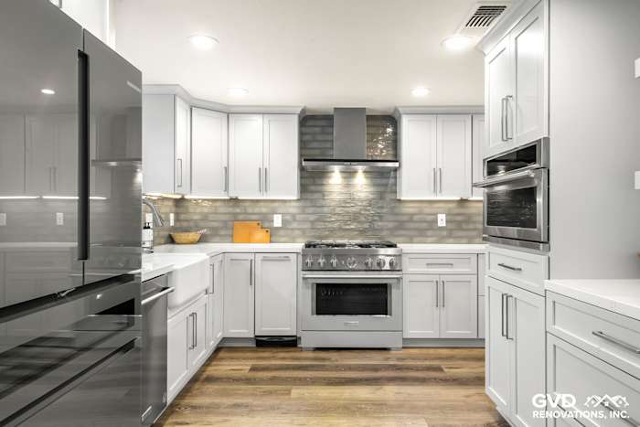 Modern kitchen remodel featuring gray cabinets, stainless steel appliances, and neutral backsplash in Rocklin, CA