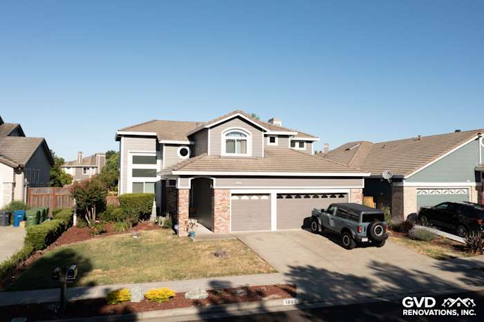 Home exterior showcasing James Hardie lap siding in Aged Pewter and Alside Mezzo vinyl windows in Petaluma, CA